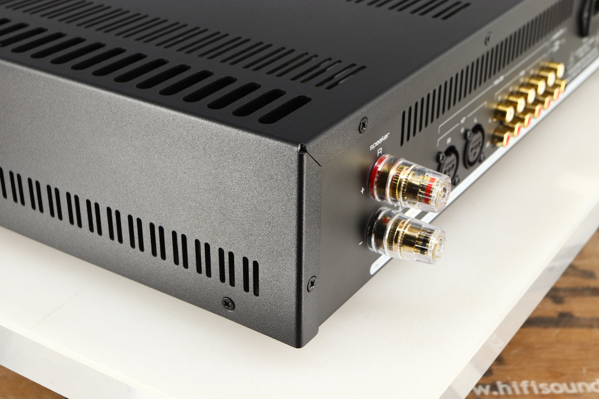 Rear right corner of a used Astin Trew AT2-2100 Integrated Amplifier in a black finish