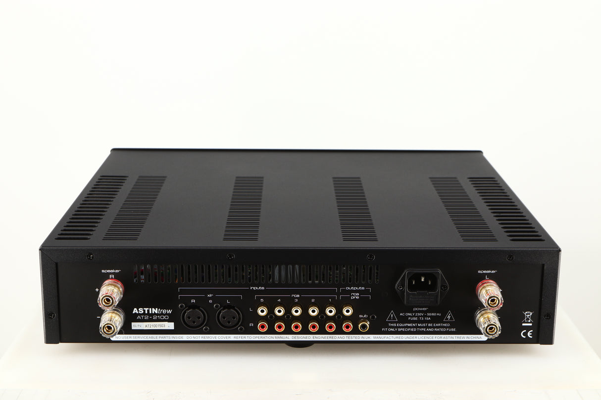 Rear view of a used Astin Trew AT2-2100 Integrated Amplifier in a black finish showing Phono Inputs, Phono Outputs, XLR Inputs, Mains Input and Speaker Outputs