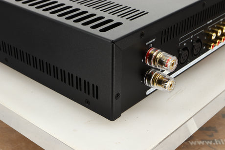 Rear left corner view of an Astin Trew AT2-2100 Integrated Amplifier in Red finish