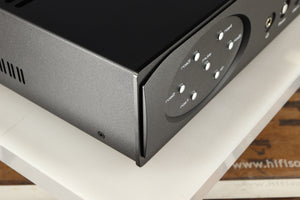 Front left corner of a used Astin Trew AT2-2100 Integrated Amplifier in a black finish