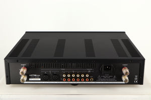 Rear view of a used Astin Trew AT2-2100 Integrated Amplifier in a black finish showing Phono Inputs, Phono Outputs, Mains Input, XLR Inputs and Speaker Outputs