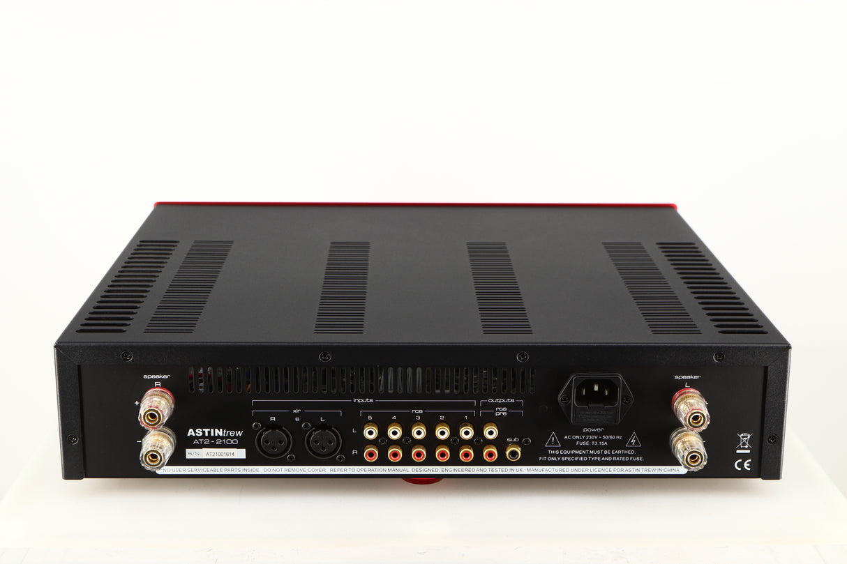 Rear view of a used Astin Trew AT2-2100 Integrated Amplifier in a red finish showing Phono Inputs, Phono Outputs, Speaker Outputs, XLR Inputs and Mains Input