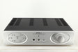 Front view of a used Astin Trew AT2-2100 Integrated Amplifier in a silver finish