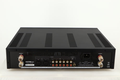 Rear view of a used Astin Trew AT2-2100 Integrated Amplifier in a silver finish showing Phono Inputs, Phono Outputs, Speaker Outputs and Mains Input