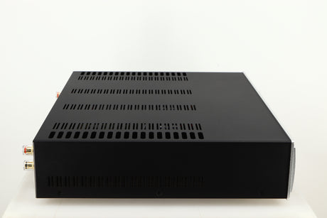 Left side view of a used Astin Trew AT2-2100 Integrated Amplifier in a silver finish