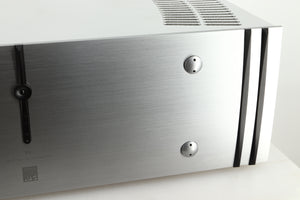 Close up view of a used ATC P1 Power Amplifier in silver finish showing the right side of the fascia