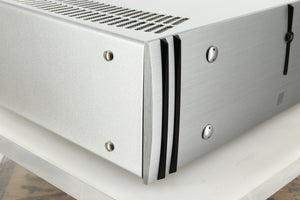 Front left corner view of a used ATC P1 Power Amplifier in silver finish 