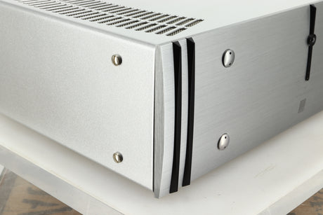 Front left corner view of a used ATC P1 Power Amplifier in silver finish 