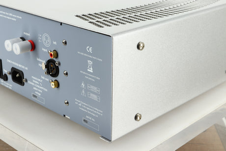 Rear right corner view of a used ATC P1 Power Amplifier in silver finish 