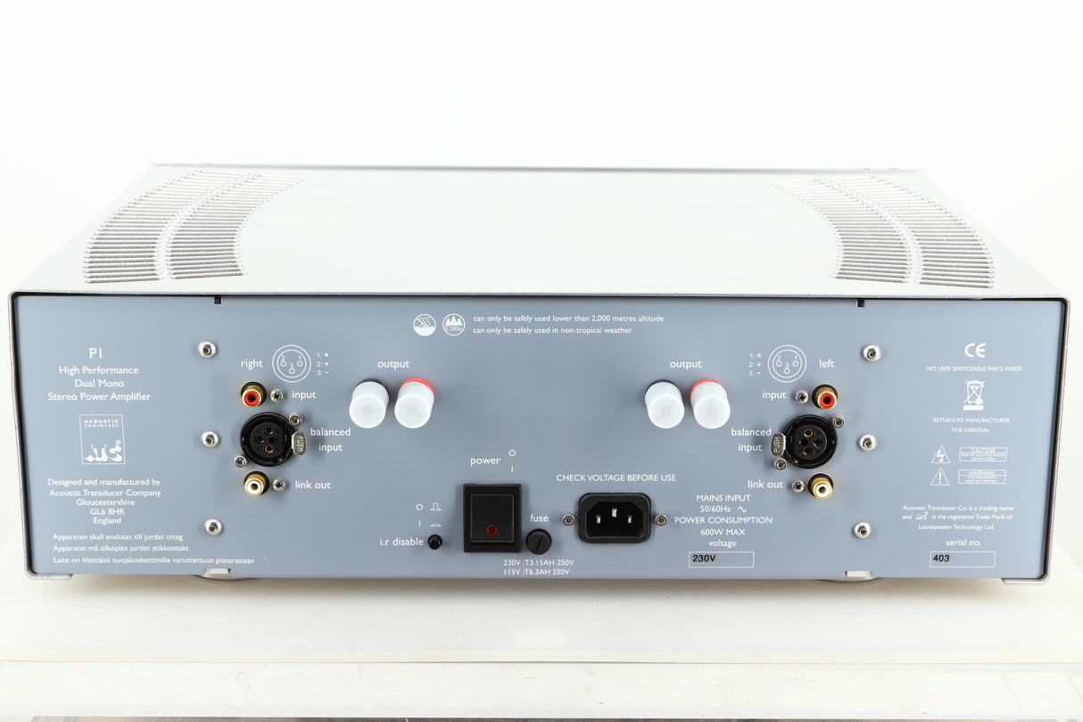 Rear view of a used ATC P1 Power Amplifier in silver finish showing Speaker outputs, mains, XLR, and RCA inputs