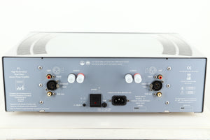 Rear view of a used ATC P1 Power Amplifier in silver finish showing Speaker outputs, mains, XLR, and RCA inputs