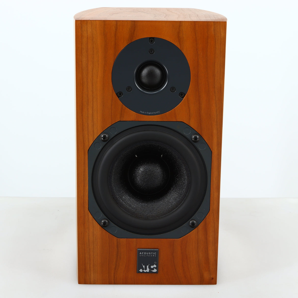 Front view of a used ATC SCM7 Standmount Speaker in a cherry finish