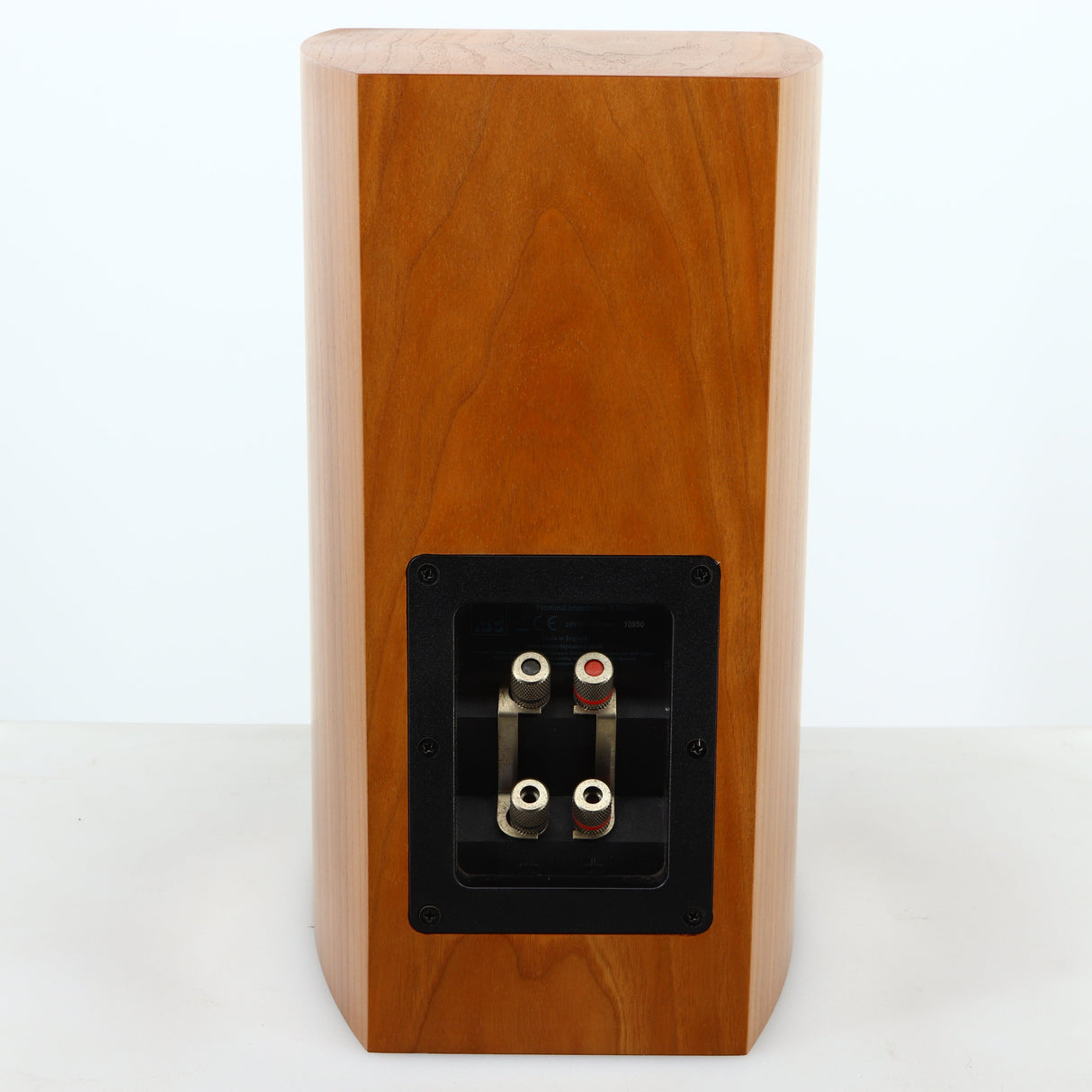 Rear view of a used ATC SCM7 Standmount Speaker in a cherry finish
