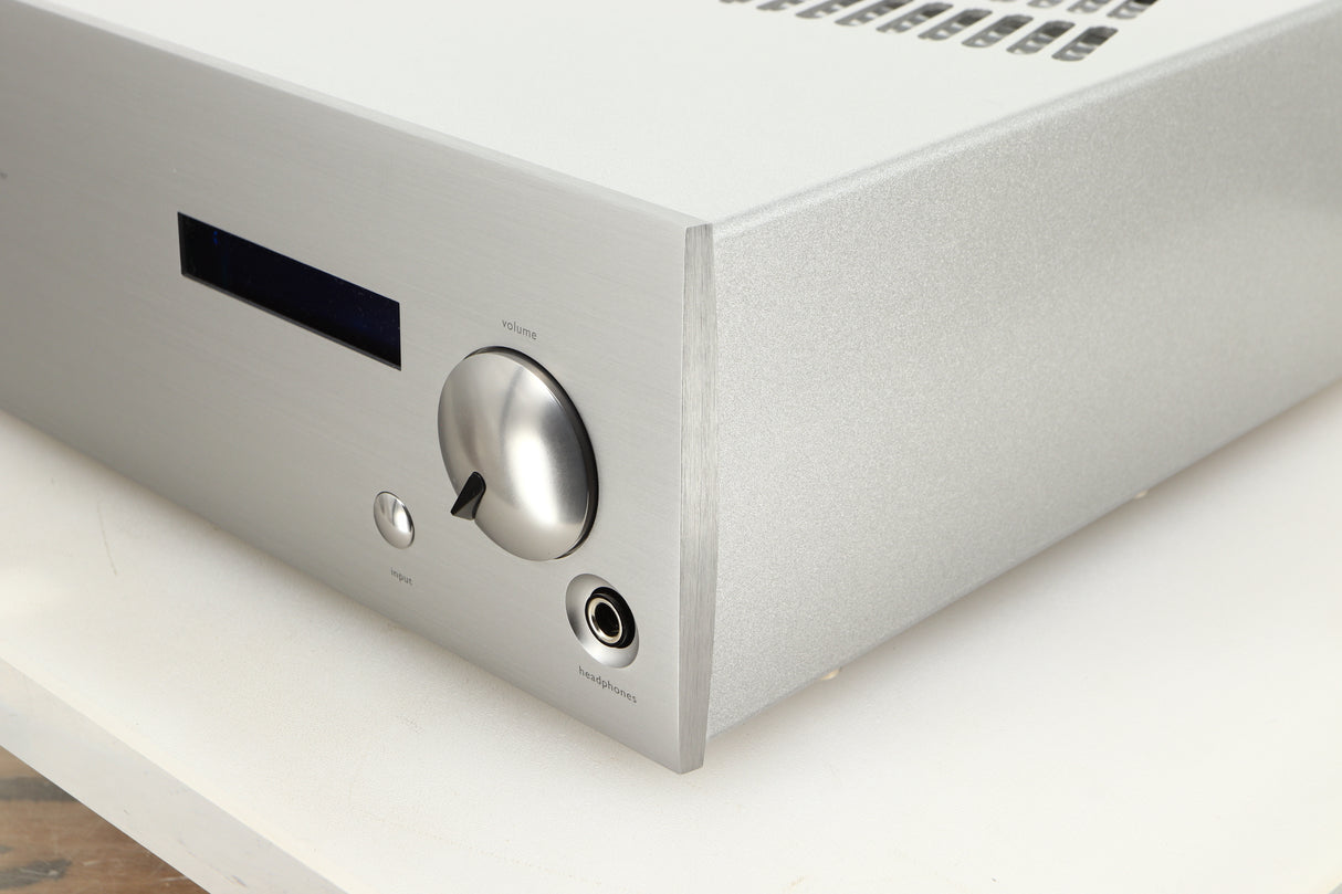 Front right corner view of a used ATC SIA2-100 Integrated Amplifier in Silver finish 