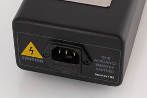 Close up of a used Atlas EOS Modular 4-Way Mains Block in a Black finish showing serial number