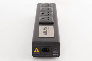 Left side view of a used Atlas EOS Modular 4-Way Mains Block in a Black finish