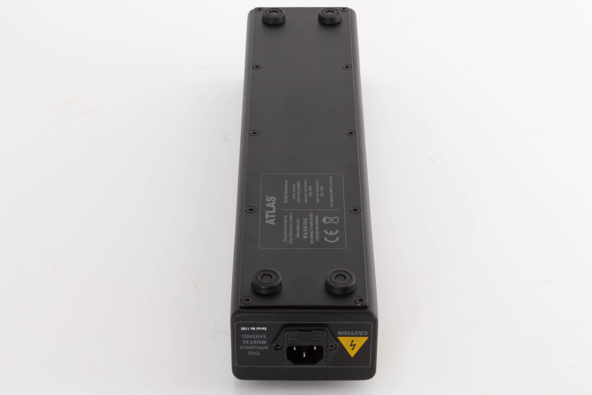 Underside of a used Atlas EOS Modular 4-Way Mains Block in a Black finish