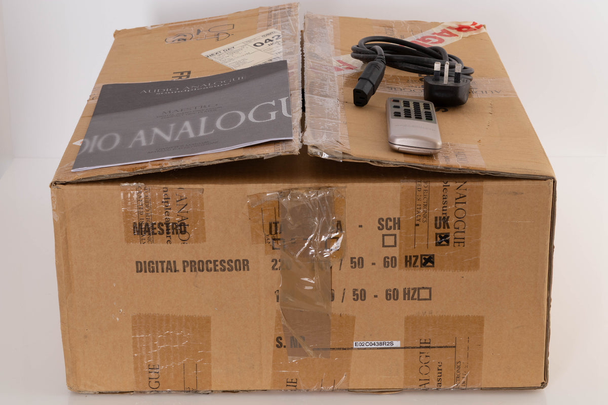 Box of a used Audio Analogue Maestro CD Player in Silver with mains cable, manual, and remote