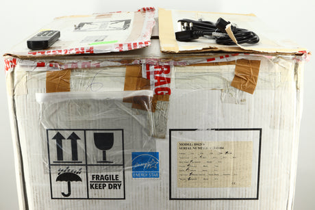 Box of a used Audio Research DSi200 Integrated Amplifier in silver finish showing mains cable, and remote