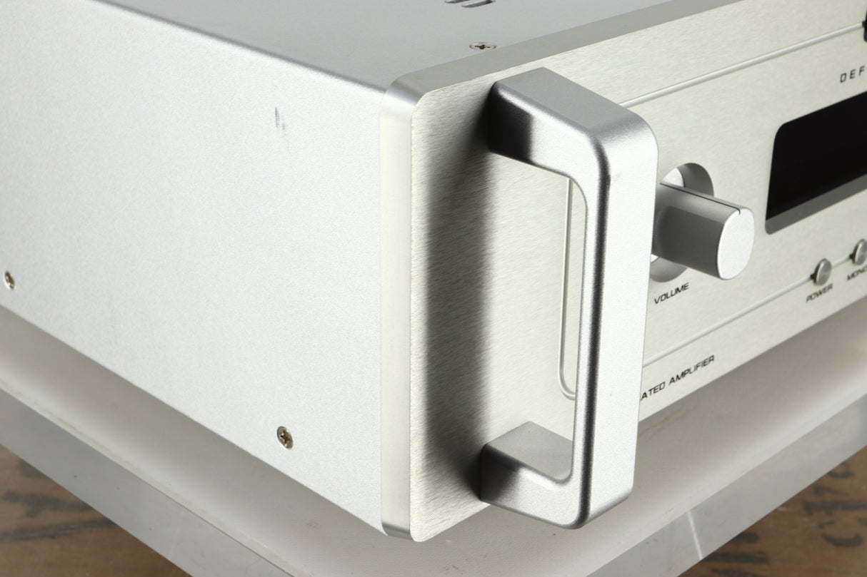 Front left corner view of a used Audio Research DSi200 Integrated Amplifier in silver finish showing a mark on the left side near the front