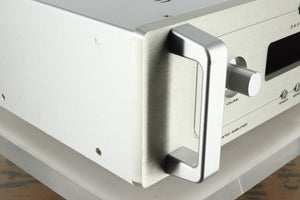 Front left corner view of a used Audio Research DSi200 Integrated Amplifier in silver finish showing a mark on the left side near the front