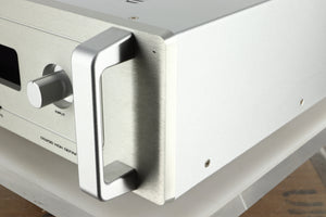 Front right corner view of a used Audio Research DSi200 Integrated Amplifier in silver finish showing a small dent on the top right of the fascia