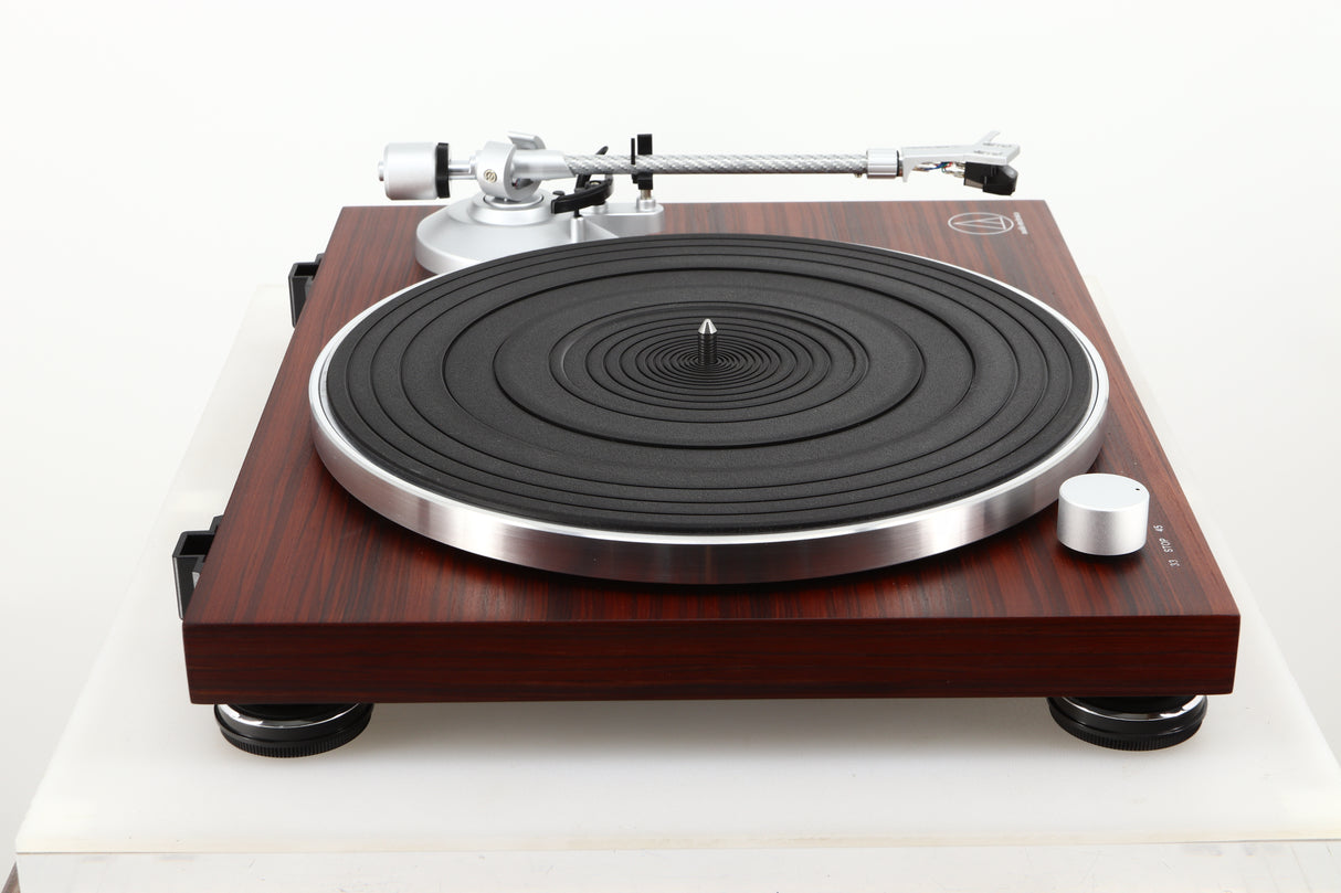 Side view of a used Audio Technica AT-LPW50BT Turntable in Rosewood finish 