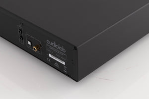 Rear left corner of a used Audiolab 6000CDT CD Transport in a Black finish