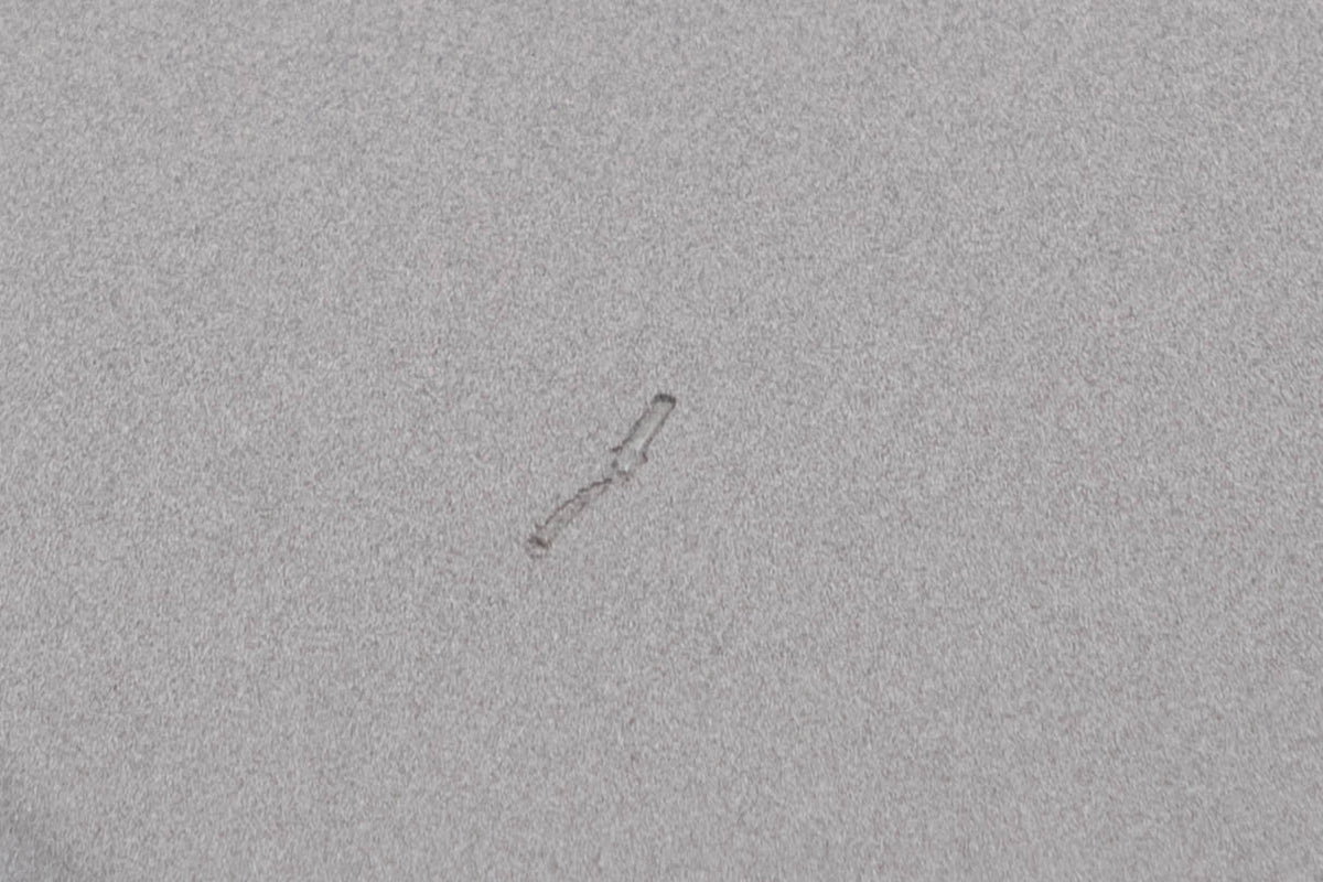 Close up of a used Audiolab 6000N Play Network Streamer in a Silver finish showing tiny scratch on top