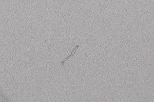 Close up of a used Audiolab 6000N Play Network Streamer in a Silver finish showing tiny scratch on top