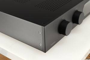 Front left corner of a used Audiolab 7000A Integrated Amplifier in a black finish