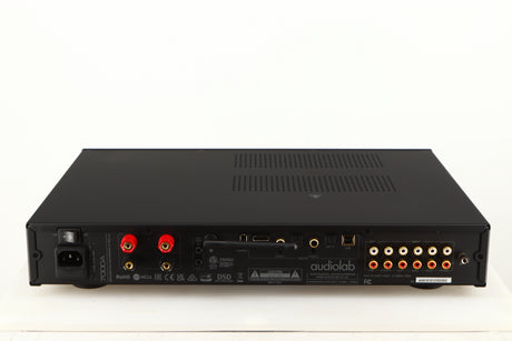 Rear view of a used Audiolab 7000A Integrated Amplifier in a black finish showing Mains Input, Phono Inputs, Phono Outputs, Optical Inputs, HDMI Input and USB Input