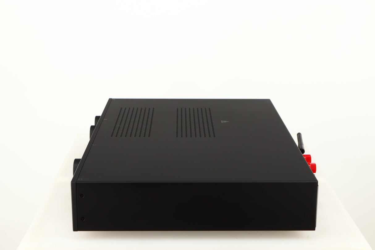 Right side view of a used Audiolab 7000A Integrated Amplifier in a black finish
