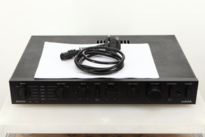 View of a used Audiolab 8000A Integrated Amplifier showing mains cable 