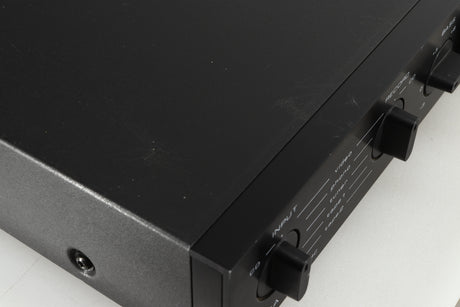 Close up of a used Audiolab 8000A Integrated Amplifier in a black finish showing some damage