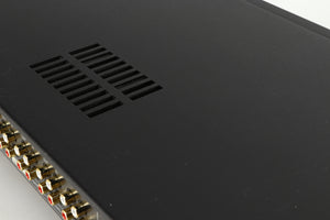 Close up of a used Audiolab 8000A Integrated Amplifier in a black finish showing some damage