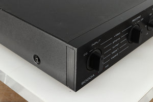 Front left corner of a used Audiolab 8000A Integrated Amplifier in a black finish