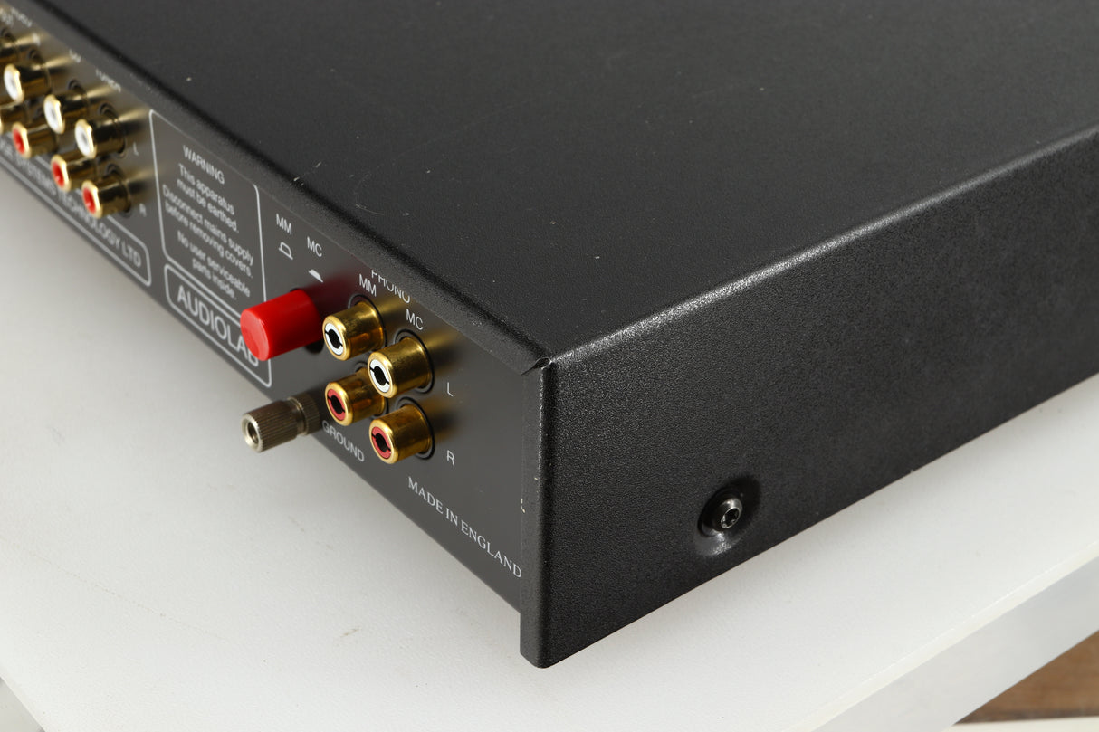 Rear left corner of a used Audiolab 8000A Integrated Amplifier in a black finish