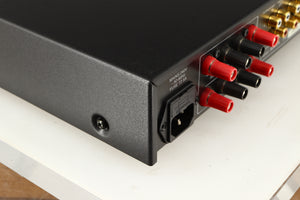 Rear right corner of a used Audiolab 8000A Integrated Amplifier in a black finish