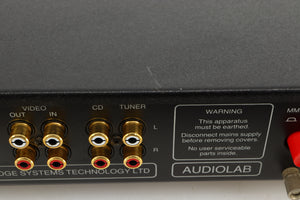 Close up view of a used Audiolab 8000C Pre Amplifier in Black finish showing scratching on the top 