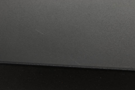 Close up view of a used Audiolab 8000C Pre Amplifier in Black finish showing scratching on the top 