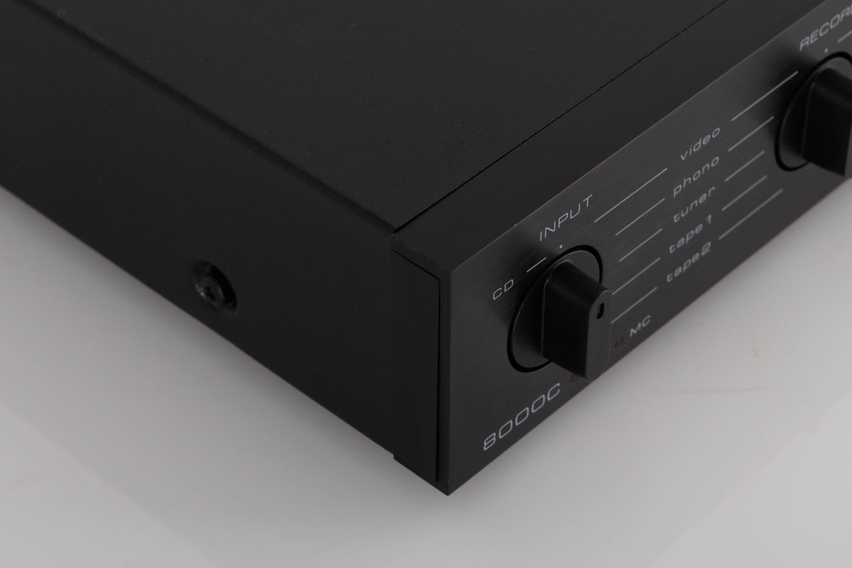 Front left corner of a used Audiolab 8000C Pre Amplifier in a Black finish
