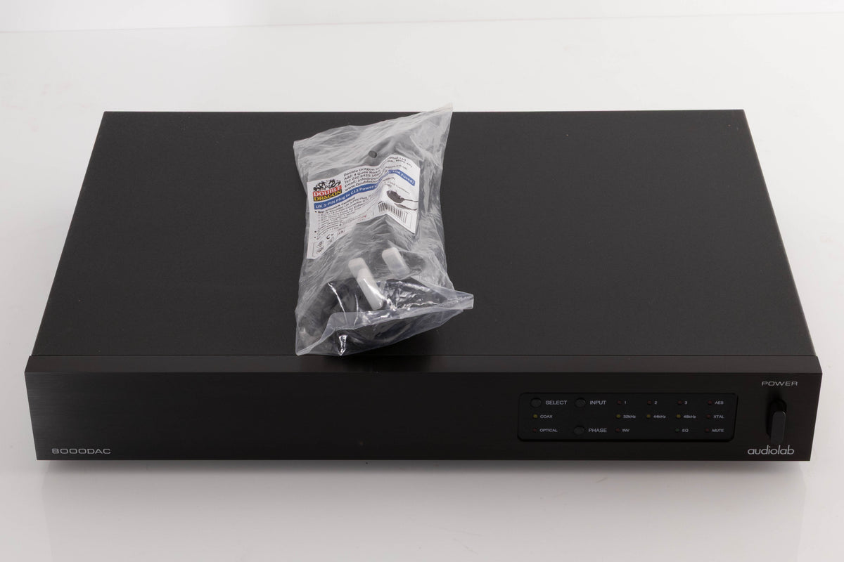 Top of a used Audiolab 8000DAC Digital Analogue Converter in a Black finish showing Mains Cable