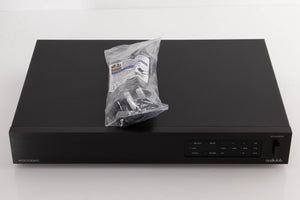 Top of a used Audiolab 8000DAC Digital Analogue Converter in a Black finish showing Mains Cable