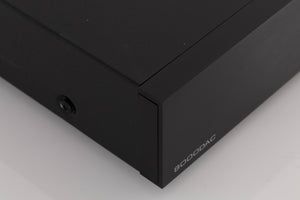 Front left corner of a used Audiolab 8000DAC Digital Analogue Converter in a Black finish