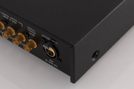Rear left corner of a used Audiolab 8000DAC Digital Analogue Converter in a Black finish