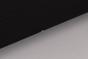 Close up of a used Audiolab 8000P Power Amplifier in a Black finish showing small blemish on front panel