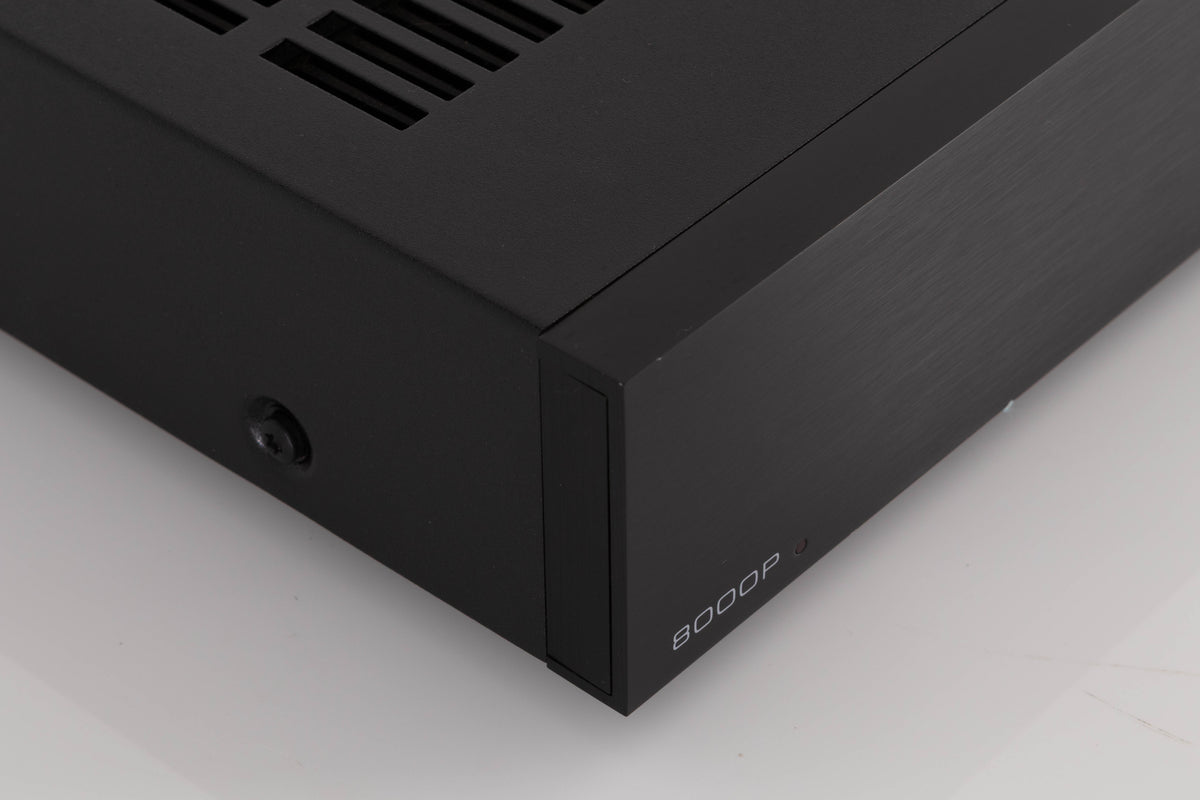 Front left corner of a used Audiolab 8000P Power Amplifier in a Black finish