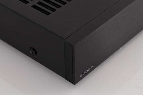 Front left corner of a used Audiolab 8000P Power Amplifier in a Black finish