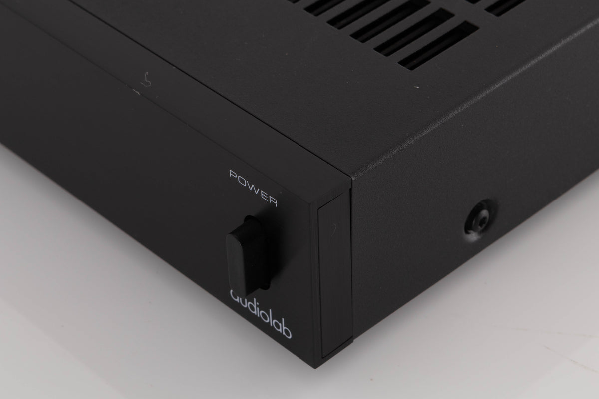 Front right corner of a used Audiolab 8000P Power Amplifier in a Black finish